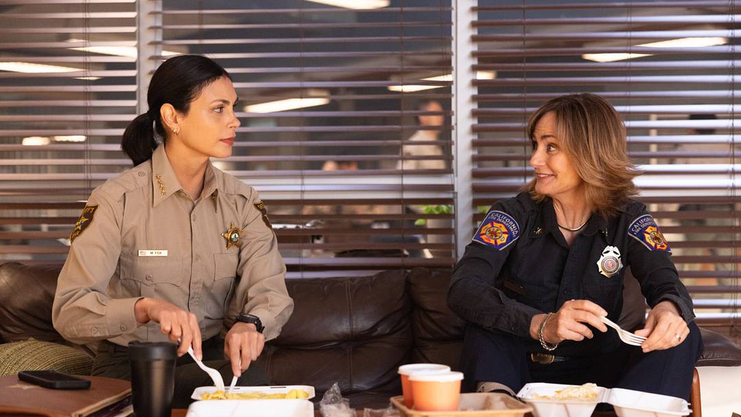 “Death & Taxes” – Pictured: Morena Baccarin as Sheriff Mickey Fox and Diane Farr as Sharon. Photo: Darren Goldstein/CBS ©2025 CBS Broadcasting, Inc. All Rights Reserved.