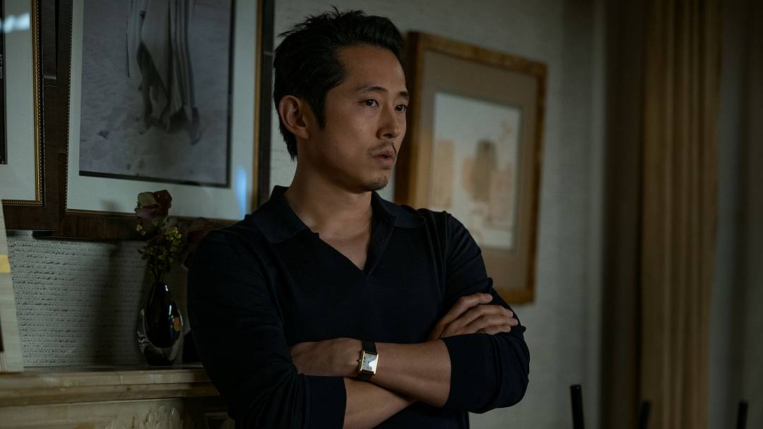 ANIMALS. Steven Yeun as Sam in Animals. Cr. Warrick Page/Netflix © 2026. ANIMALS. Steven Yeun as Sam in Animals. Cr. Warrick Page/Netflix © 2026.