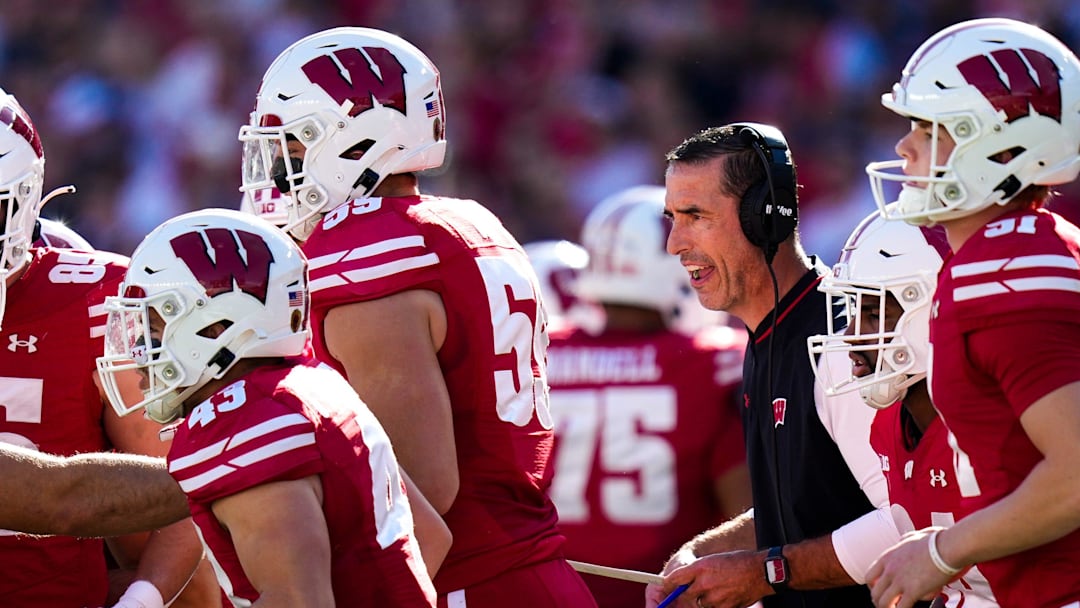 Wisconsin Badgers head coach Luke Fickell speaks to his players in the first half at Camp Randall Stadium on Saturday, Oct. 18, 2025 in Madison, Wisconsin.