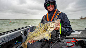Expert walleye troller Jason Julian of Church Tackle explains how to slow down, size up, and follow shallow bait to catch trophy Lake Erie walleyes when the water dips below 50°F.
