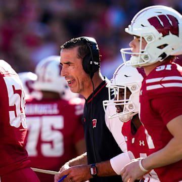 Wisconsin Badgers head coach Luke Fickell speaks to his players in the first half at Camp Randall Stadium on Saturday, Oct. 18, 2025 in Madison, Wisconsin.