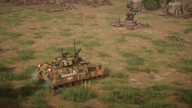 Menace screenshot showing a tank taking aim at a defense turret.