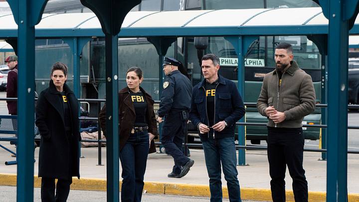 “Fidelity” — CBS Original Series FBI, scheduled to air on Monday, April 27 (9:00-10:00 PM, ET/PT). Pictured (L-R): Missy Peregrym as Special Agent Maggie Bell, Juliana Aidén Martinez as Eva Ramos, John Boyd as Special Agent Stuart Scola, and Zeeko Zaki as Special Agent Omar Adom ‘OA’ Zidan. Photo: Bennett Raglin/CBS ©2026 CBS Broadcasting, Inc. All Rights Reserved.