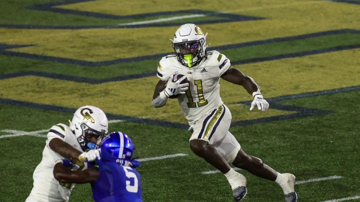 Aug 31, 2024; Atlanta, Georgia, USA; Georgia Tech Yellow Jackets running back Jamal Haynes (11) runs the ball against Georgia State Panthers in the second quarter at Bobby Dodd Stadium at Hyundai Field. Mandatory Credit: Brett Davis-USA TODAY Sports