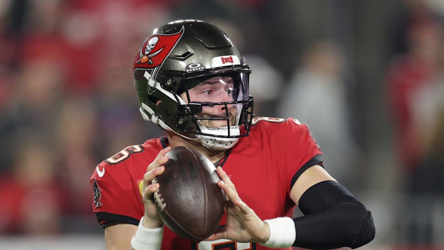 Tampa Bay Buccaneers quarterback Baker Mayfield (6) rolls out during the first quarter of a NFC wild card playoff. | Nathan Ray Seebeck-Imagn Images