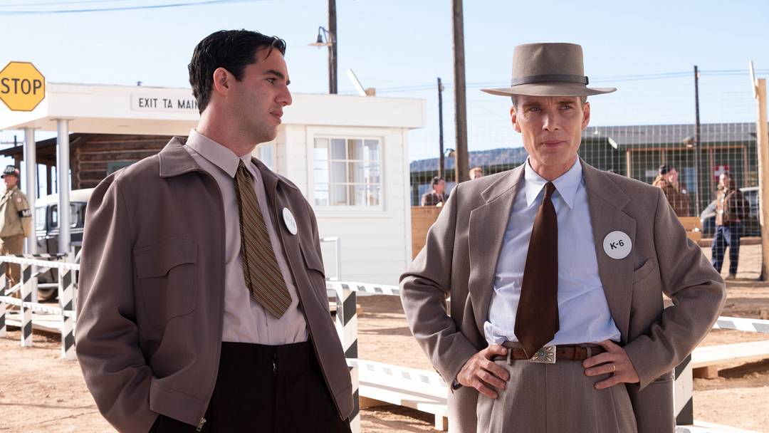 L to R: Benny Safdie is Edward Teller and Cillian Murphy is J. Robert Oppenheimer in OPPENHEIMER, written, produced, and directed by Christopher Nolan. L to R: Benny Safdie is Edward Teller and Cillian Murphy is J. Robert Oppenheimer in OPPENHEIMER, written, produced, and directed by Christopher Nolan.
