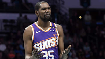 Jan 7, 2025; Charlotte, North Carolina, USA;  Phoenix Suns forward Kevin Durant (35) reacts to a foul call during the first half against the Charlotte Hornets at the Spectrum Center. Mandatory Credit: Sam Sharpe-Imagn Images
