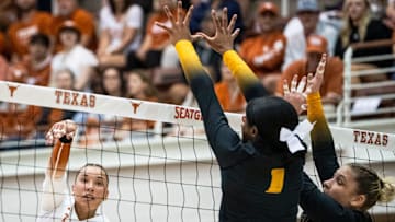 Texas Longhorns outside hitter Madisen Skinner (6) hits the ball over the net during the Longhorns' match-up with the Missouri Tigers at the Gregory Gym in Austin, Nov. 1, 2024.