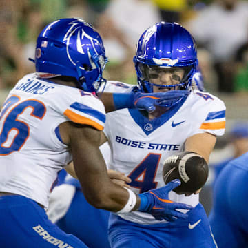 Boise State quarterback Maddux Madsen hands the ball off to Boise State running back Sire Gaines as the Oregon Ducks host the Boise State Broncos Saturday, Sept. 7, 2024 at Autzen Stadium in Eugene, Ore.