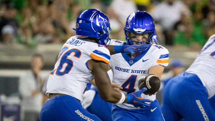 Boise State quarterback Maddux Madsen hands the ball off to Boise State running back Sire Gaines as the Oregon Ducks host the Boise State Broncos Saturday, Sept. 7, 2024 at Autzen Stadium in Eugene, Ore. Boise State quarterback Maddux Madsen hands the ball off to Boise State running back Sire Gaines as the Oregon Ducks host the Boise State Broncos Saturday, Sept. 7, 2024 at Autzen Stadium in Eugene, Ore.