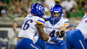 Boise State quarterback Maddux Madsen hands the ball off to Boise State running back Sire Gaines as the Oregon Ducks host the Boise State Broncos Saturday, Sept. 7, 2024 at Autzen Stadium in Eugene, Ore.