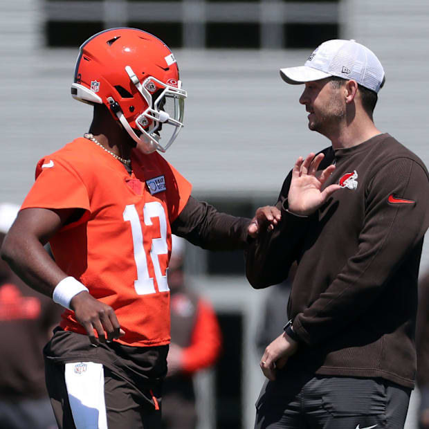 Cleveland Browns quarterback Shedeur Sanders (12) works with offensive coordinator Tommy Rees during NFL rookie minicamp at t