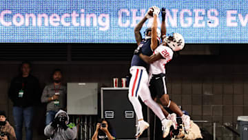 Nov 15, 2024; Tucson, Arizona, USA; Arizona Wildcats wide receiver Tetairoa McMillan (4) catches the ball to make a touchdown during the first quarter against the Houston Cougars at Arizona Stadium. Mandatory Credit: Aryanna Frank-Imagn Images