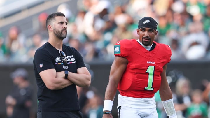 Aug 1, 2024; Philadelphia, PA, USA; Philadelphia Eagles quarterback Jalen Hurts (1) talks with head coach Nick Sirianni (L) during a practice at Lincoln Financial Field. Mandatory Credit: Bill Streicher-USA TODAY Sports