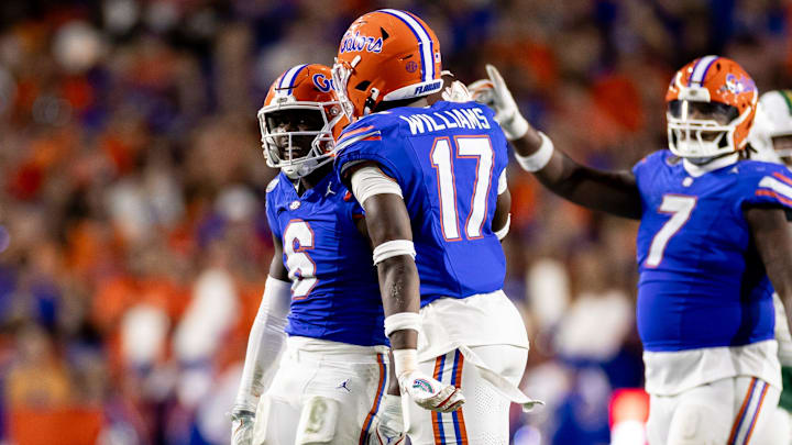 Florida Gators linebacker Shemar James (6) celebrates with Florida Gators linebacker Scooby Williams (17) after a sack during the first half against the Charlotte 49ers at Steve Spurrier Field at Ben Hill Griffin Stadium in Gainesville, FL on Saturday, September 23, 2023. [Matt Pendleton/Gainesville Sun]