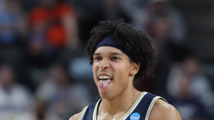 Akron's Enrique Freeman (25) celebrates after a shot during the second half of an NCAA Tournament first-round game against Creighton, Thursday, March 21, 2024 in Pittsburgh.