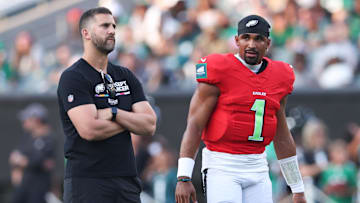 Aug 1, 2024; Philadelphia, PA, USA; Philadelphia Eagles quarterback Jalen Hurts (1) talks with head coach Nick Sirianni (L) during a practice at Lincoln Financial Field. Mandatory Credit: Bill Streicher-Imagn Images