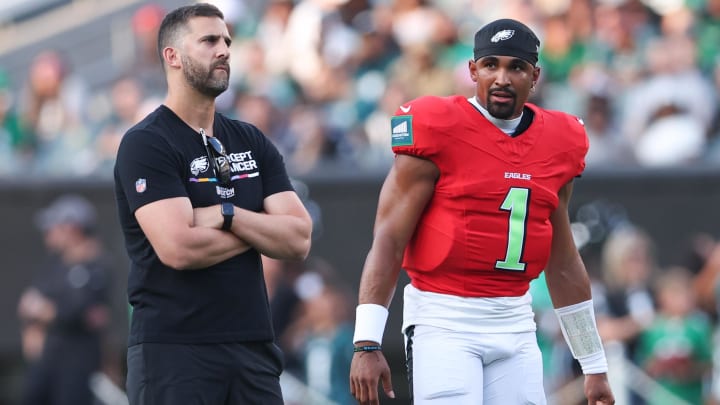 Aug 1, 2024; Philadelphia, PA, USA; Philadelphia Eagles quarterback Jalen Hurts (1) talks with head coach Nick Sirianni (L) during a practice at Lincoln Financial Field. Mandatory Credit: Bill Streicher-USA TODAY Sports