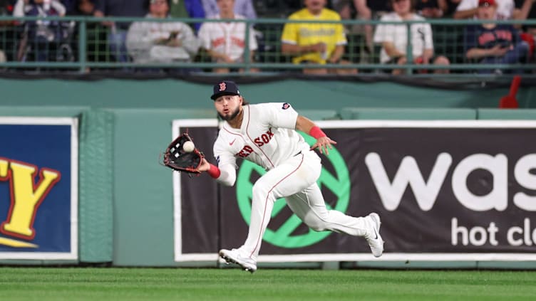 Sep 10, 2024; Boston, Massachusetts, USA; Boston Red Sox right fielder Wilyer Abreu (52) catches a fly ball during the sixth inning against the Baltimore Orioles at Fenway Park. Mandatory Credit: Paul Rutherford-Imagn Images