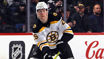 The Boston Bruins sent blue liner Brandon Carlo to the Toronto Maple Leafs in a three-team deal.