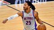 Jan 18, 2021; Miami, Florida, USA; Detroit Pistons guard Derrick Rose (25) controls the ball against the Miami Heat during the first half at American Airlines Arena. Mandatory Credit: Jasen Vinlove-Imagn Images