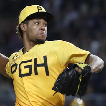 Jun 30, 2023; Pittsburgh, Pennsylvania, USA; Pittsburgh Pirates relief pitcher Dauri Moreta (36) pitches against the Milwaukee Brewers during the seventh inning at PNC Park. Mandatory Credit: Charles LeClaire-Imagn Images
