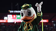 Oct 18, 2025; Piscataway, New Jersey, USA;  The Oregon Ducks mascot reacts during the first half against the Rutgers Scarlet Knights at SHI Stadium. Mandatory Credit: Vincent Carchietta-Imagn Images