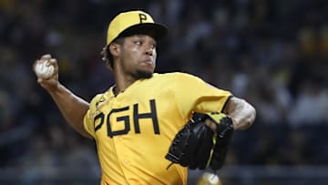 Jun 30, 2023; Pittsburgh, Pennsylvania, USA; Pittsburgh Pirates relief pitcher Dauri Moreta (36) pitches against the Milwaukee Brewers during the seventh inning at PNC Park. Mandatory Credit: Charles LeClaire-Imagn Images