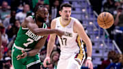 Jan 31, 2025; New Orleans, Louisiana, USA;  Boston Celtics guard Jaylen Brown (7) passes the ball against New Orleans Pelicans center Karlo Matkovic (17) during the second half at Smoothie King Center. Mandatory Credit: Stephen Lew-Imagn Images