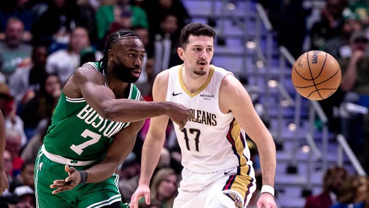 Jan 31, 2025; New Orleans, Louisiana, USA; Boston Celtics guard Jaylen Brown (7) passes the ball against New Orleans Pelicans center Karlo Matkovic (17) during the second half at Smoothie King Center. Mandatory Credit: Stephen Lew-Imagn Images