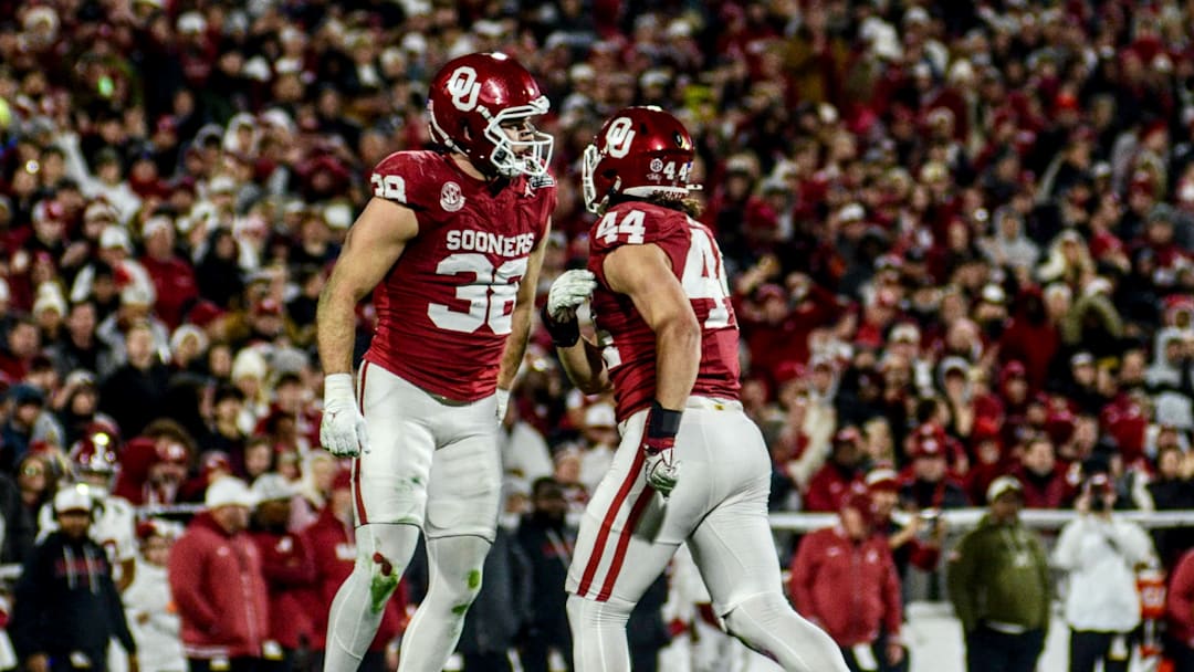Oklahoma linebacker Owen Heinecke, defensive end Taylor Wein celebrate after a sack against Alabama in the CFP.