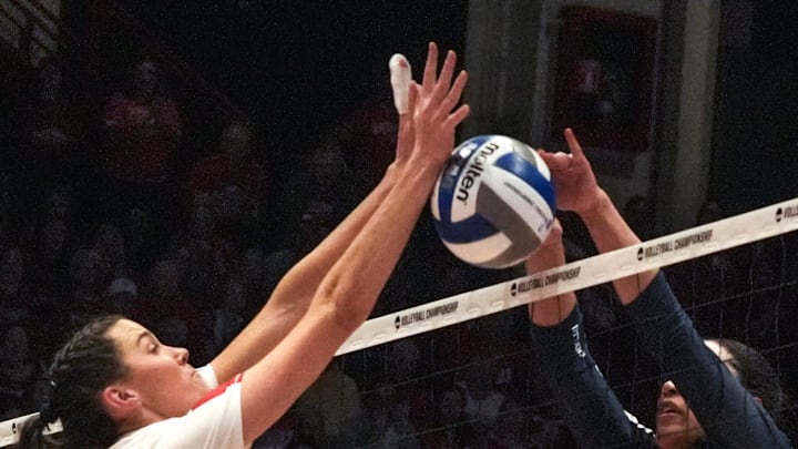 Penn State graduate student setter Seleisa Elisaia (5) pushes the ball over to Wisconsin's side in the third set during the 2022 NCAA volleyball tournament. Penn State graduate student setter Seleisa Elisaia (5) pushes the ball over to Wisconsin's side in the third set during the 2022 NCAA volleyball tournament.