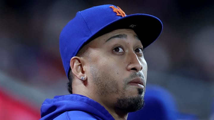 Jun 11, 2024; New York City, New York, USA; New York Mets relief pitcher Edwin Diaz watches from the dugout during the seventh inning against the Miami Marlins at Citi Field. Mandatory Credit: Brad Penner-USA TODAY Sports