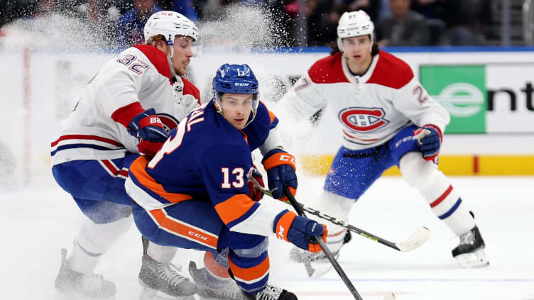 Feb 20, 2022; Elmont, New York, USA; New York Islanders center Mathew Barzal (13) controls the puck