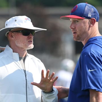 Bills head coach Sean McDermott talks with offensive coordinator Joe Brady during drills on the opening day of Buffalo Bills training camp at St. John Fisher University in Pittsford Wednesday, July 24, 2024.