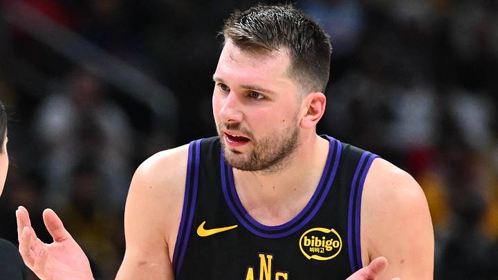 Jan 30, 2026; Washington, District of Columbia, USA; Los Angeles Lakers forward/guard Luka Doncic (77) talks with referee Natalie Sago (9) during the second half at Capital One Arena. Mandatory Credit: Brad Mills-Imagn Images