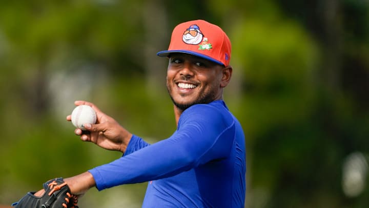 The New York Mets starting pitcher Freddy Peralta throws during spring training on the back fields of Clover Park on Feb. 11, 2026, in Port St. Lucie.