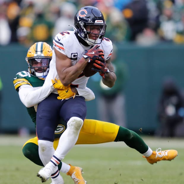 Green Bay Packers cornerback Keisean Nixon tackles Chicago Bears wide receiver DJ Moore
