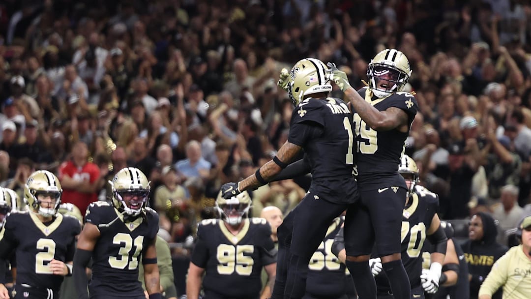 Oct 26, 2025; New Orleans, Louisiana, USA; New Orleans Saints cornerback Alontae Taylor (1) and cornerback Quincy Riley (29) react during the first quarter against the Tampa Bay Buccaneers  at Caesars Superdome. Mandatory Credit: Stephen Lew-Imagn Images