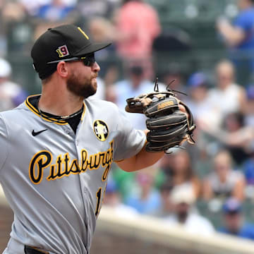 Aug 16, 2025; Chicago, Illinois, USA; Pittsburgh Pirates shortstop Jared Triolo (19) throws during a game against the Chicago Cubs at Wrigley Field. Mandatory Credit: Patrick Gorski-Imagn Images