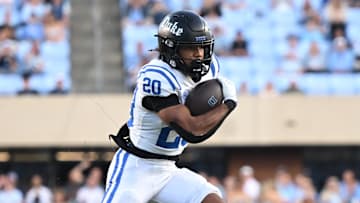 Nov 22, 2025; Chapel Hill, North Carolina, USA; Duke Blue Devils running back Nate Sheppard (20) runs downfield during the first half against The North Carolina Tarat Kenan Stadium. Mandatory Credit: William Howard-Imagn Images