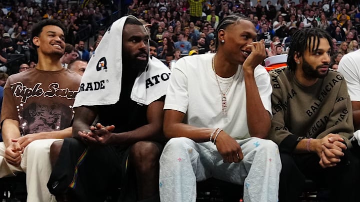 Apr 10, 2026; Denver, Colorado, USA; Members of the Denver Nuggets on the bench during the second half against the Oklahoma City Thunder  at Ball Arena. Mandatory Credit: Ron Chenoy-Imagn Images