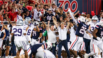 Sep 12, 2025; Tucson, Arizona, USA; Arizona Wildcats head coach Brent Brennan celebrates as defensive back Dalton Johnson (43) recovers the ball during the second quarter of the game against the Kansas State Wildcats at Arizona Stadium. Mandatory Credit: Aryanna Frank-Imagn Images