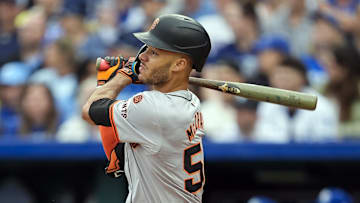 Sep 22, 2024; Kansas City, Missouri, USA; San Francisco Giants center fielder Grant McCray (58) hits an RBI triple during the second inning against the Kansas City Royals at Kauffman Stadium. Mandatory Credit: Jay Biggerstaff-Imagn Images