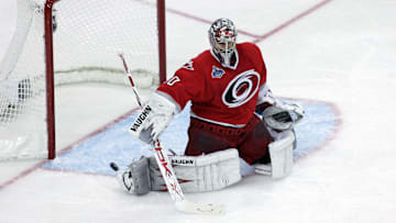 Cam Ward drops down to make a save during the 2006 Stanley Cup finals against the Oilers.