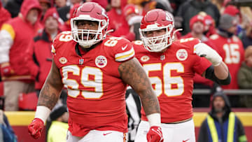 Dec 25, 2023; Kansas City, Missouri, USA; Kansas City Chiefs defensive tackle Mike Pennel Jr. (69) celebrates with defensive end George Karlaftis (56) after a play against the Las Vegas Raiders during the game at GEHA Field at Arrowhead Stadium. Mandatory Credit: Denny Medley-Imagn Images