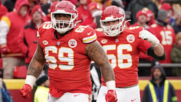 Kansas City Chiefs defensive tackle Mike Pennel Jr. (69) celebrates with defensive end George Karlaftis (56) after a play at GEHA Field at Arrowhead Stadium.