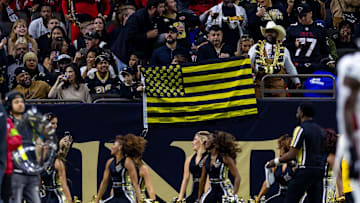 Jan 7, 2024; New Orleans, Louisiana, USA;  New Orleans Saints fans celebrate a touchdown against the Atlanta Falcons