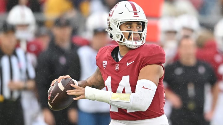 Nov 18, 2023; Stanford, California, USA; Stanford Cardinal quarterback Ashton Daniels (14) looks to throw a pass against the California Golden Bears during the first quarter at Stanford Stadium. Mandatory Credit: Robert Edwards-USA TODAY Sports