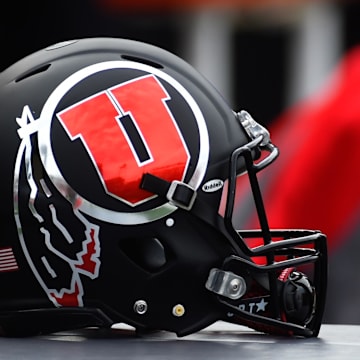 A Utah Utes helmet sits before a game against the Washington State Cougars at Martin Stadium.